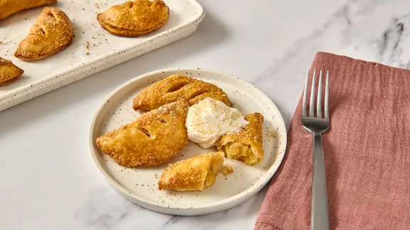 Apple hand pies with whipped cream