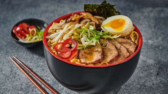 Ramen bowl with pork, egg, and vegetables