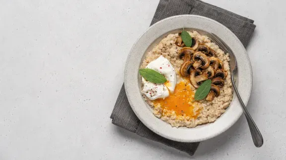 Oats with mushrooms on a plate