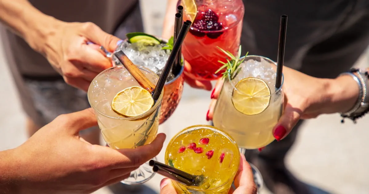 holding drinks at gathering