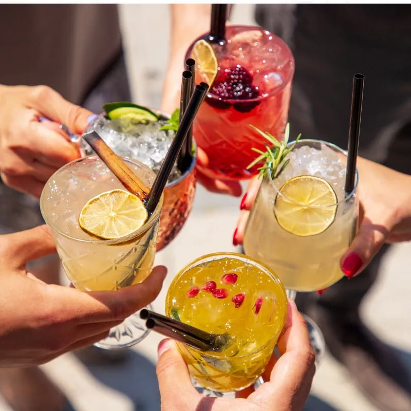 gathering holding drinks