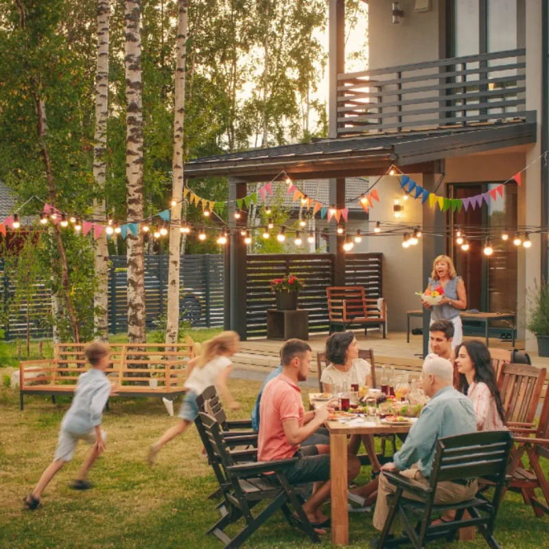family hanging out in their backyard