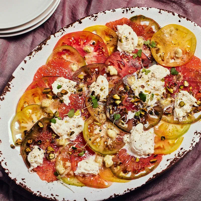grapefruit tomato carpaccio with yuzu kosho butter